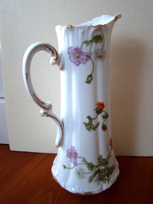 A fine and rare hand painted French Limoges porcelain ewer made between 1892-1900